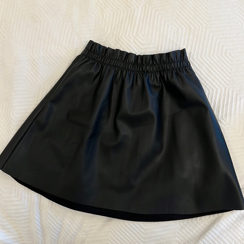 Black faux leather mini skirt